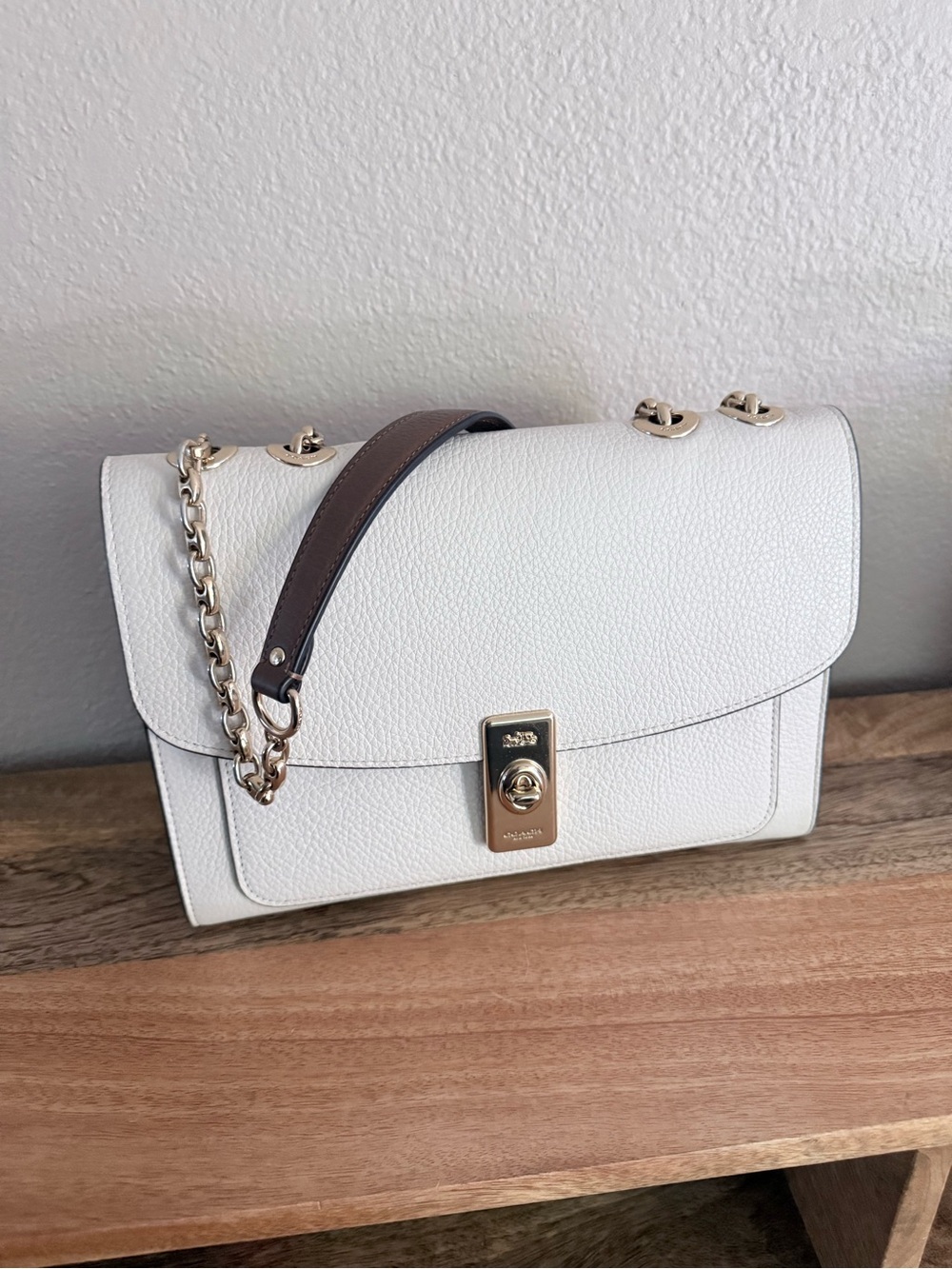 Coach White Leather Shoulder Bag with Gold Hardware and Brown Strap Accent